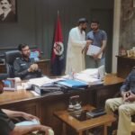 SSP East Zubair Nazir Sheikh briefing transporters on security SOPs in Karachi.