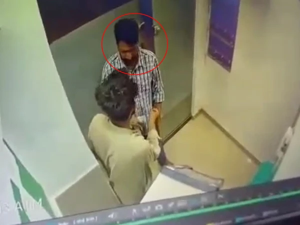 Karachi police arrest an ATM robbery suspect and recover a mobile phone and ATM card