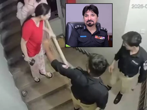 Police officials reviewing the inquiry into an apartment incident in Defence Phase 6, Karachi.