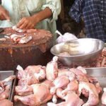 Fresh chicken meat displayed for sale at a poultry shop in Karachi