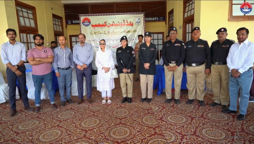Police officers and personnel participate in a blood donation camp at Karachi Police Headquarters South Zone Garden