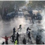 Police and security measures during violent protests in France as authorities impose curfews in several cities.