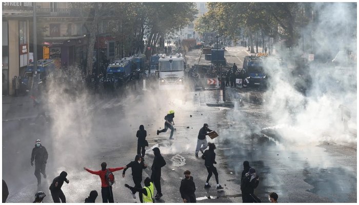 Police and security measures during violent protests in France as authorities impose curfews in several cities.