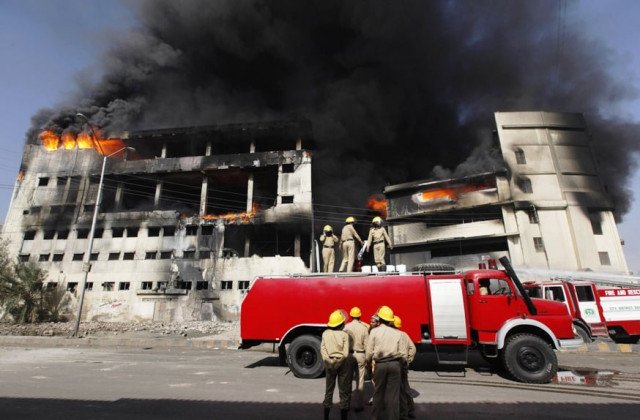 Fire brigade responding to a factory fire in Azizabad Block 2 Karachi