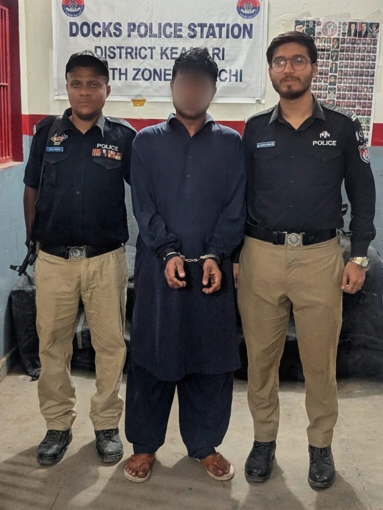 Docks Police arresting a suspected street criminal during a search operation in Sultanabad Karachi