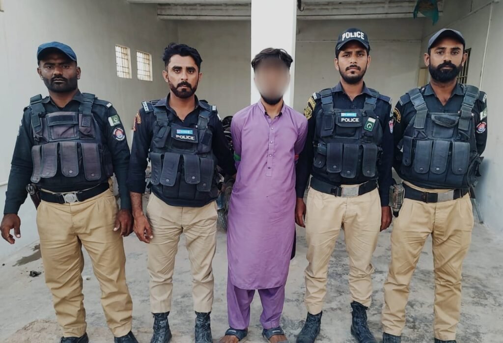 Sachal Police arresting a suspect with illegal pistol in Madina Colony Karachi
