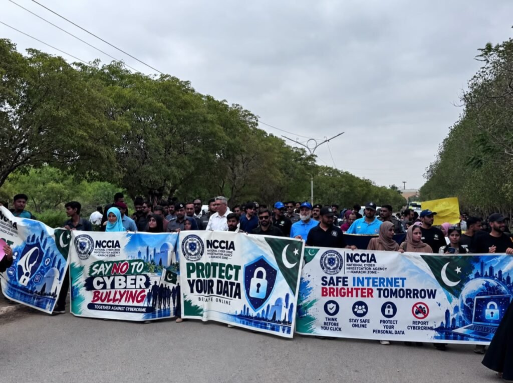 Students participate in NCCIA cyber awareness walk at Karachi University