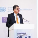 Participants at the 10th Annual Microfinance Conference in Karachi discussing financial inclusion and rural development