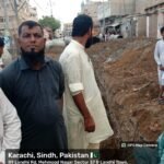 Workers replacing a 30-inch sewerage line in Union Council 6, Malir Town, Karachi