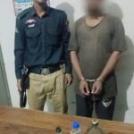 Karachi Brigade Police action against suspected liquor seller near Tauheed Chowk