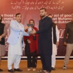 United Health Organization presents shields to doctors and medical team members at the National Museum Karachi.