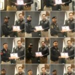 District Central Police officers in Karachi receive certificates and cash rewards for their work against street criminals.