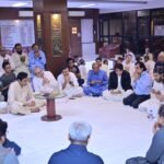 Sindh Labour Minister Saeed Ghani and KATI officials offer prayers at a condolence meeting for former KATI president Danish Khan in Karachi