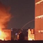 Sindh Rangers personnel assisting rescue teams at a factory fire in Azizabad Karachi
