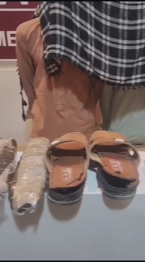 Police recover charas hidden inside shoe soles during an operation in Karachi
