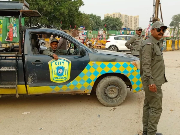 Karachi Municipal Corporation City Wardens and police personnel