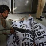 Police and crime scene unit investigate the deaths of an elderly couple in North Karachi
