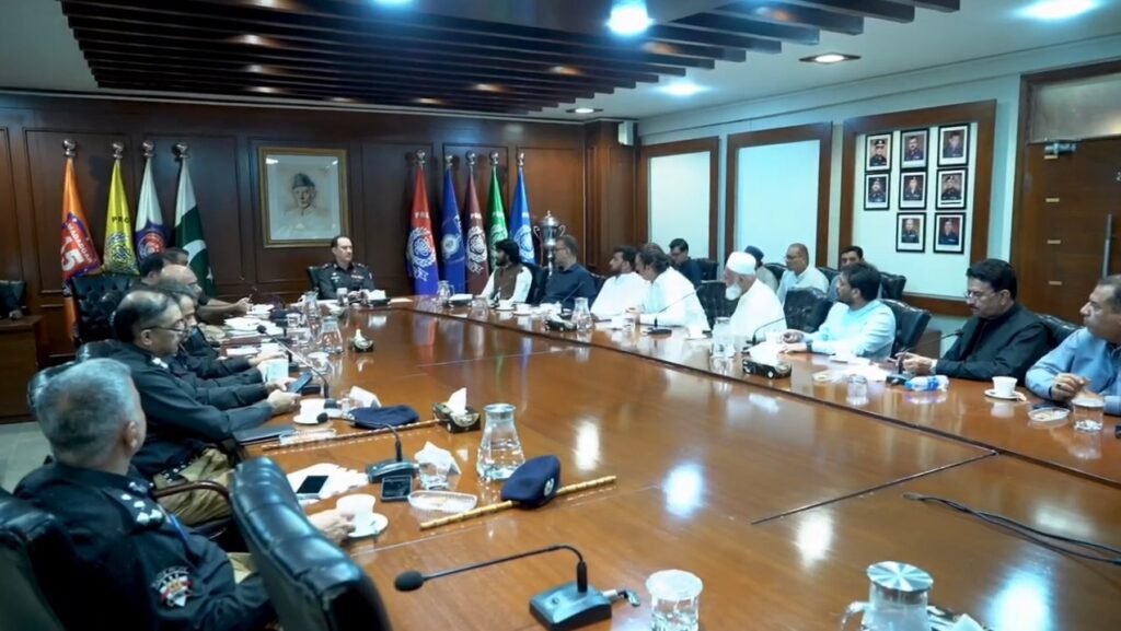 Karachi Police Chief Azad Khan meets a 12-member goods transporters delegation at Karachi Police Office to discuss transport issues and road safety.