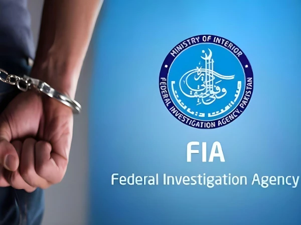 Foreign currency and mobile phones seized by FIA during an operation at a private hospital parking area in Karachi