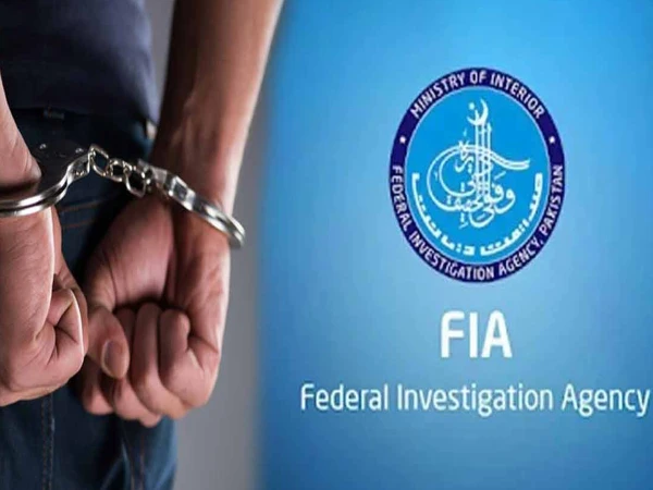 FIA officials conduct an operation at a private bank branch in Federal B Area Karachi
