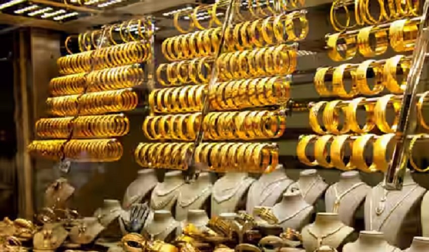 Gold bars and silver bullion as gold and silver prices increase