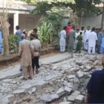 Collapsed wall at a Union Committee office in Dawood Ghazi Goth, Malir, Karachi