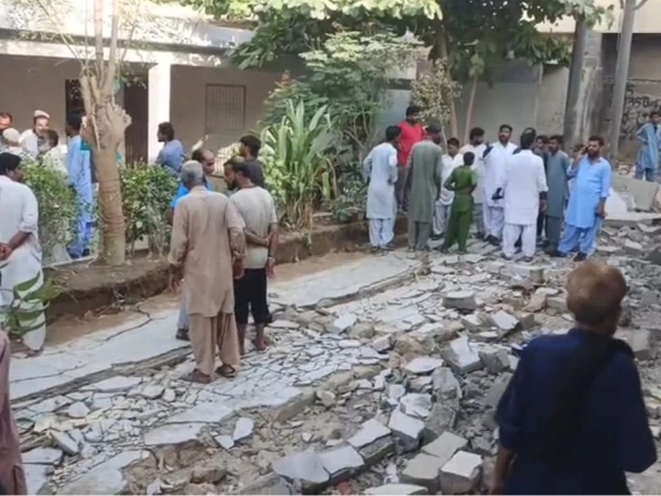 Collapsed wall at a Union Committee office in Dawood Ghazi Goth, Malir, Karachi