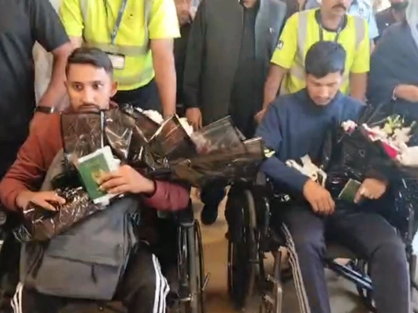 Bodies and injured Pakistani survivors arrive at Karachi Airport