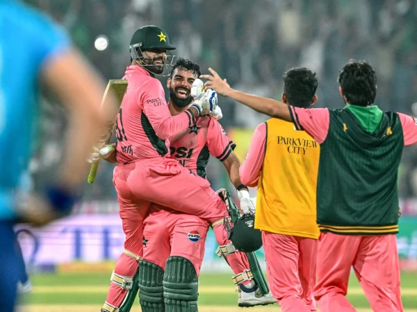 Shadab Khan celebrates his record-breaking innings with Haris Rauf in Pakistan’s ODI victory over England.