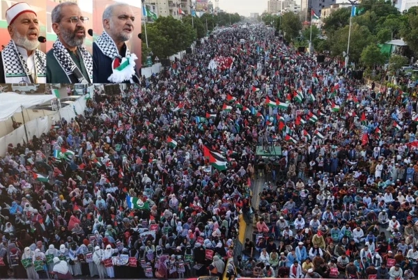 Participants holding Palestinian flags during Gaza solidarity march in Karachi